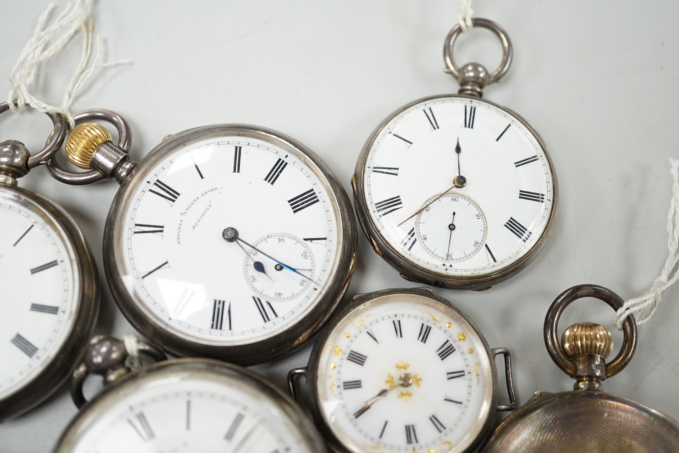 Twelve assorted mainly silver pocket watches including 'The Farringdon', Russell's and John Walker.